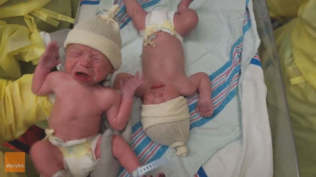 Newborn twins can't stand to be separated for more than seconds: video
