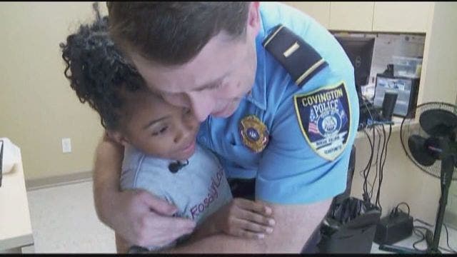Girl on mission to hug as many police officers as possible
