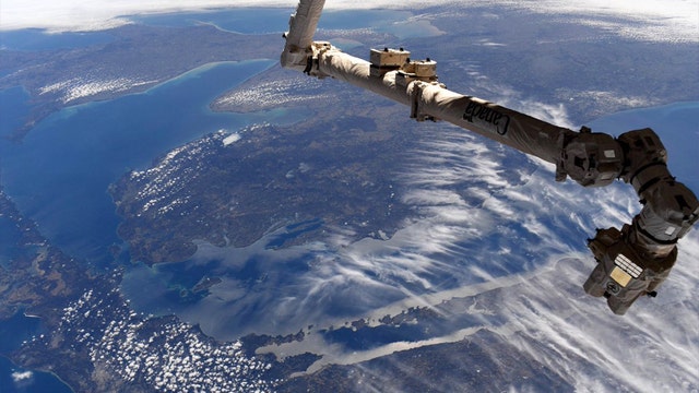 'Waiving to the mitten!' Michigan native photographs state, Great Lakes from space