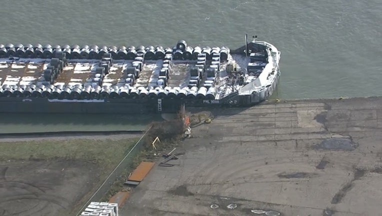 12f57cca-Barge damaged after colliding with pier on Detroit River