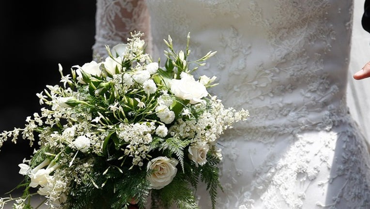 e0c3a142-GETTY bride bouquet_1553789661520.png-402429.jpg
