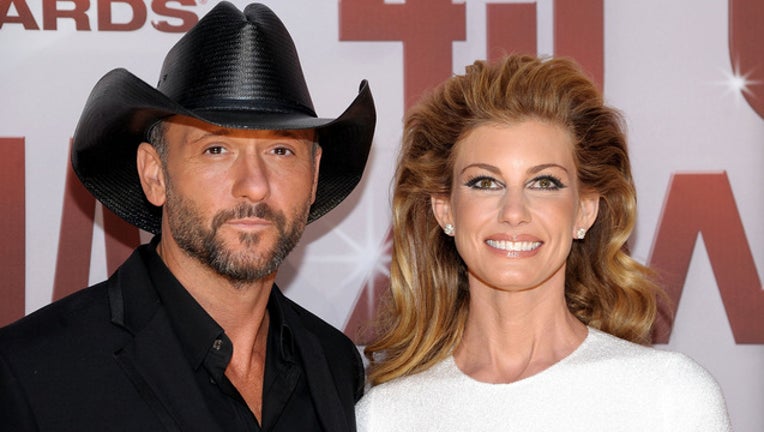 8628fd72-tim mcgraw and faith hill at the cmas GETTY IMAGE 67234698_1510324745901