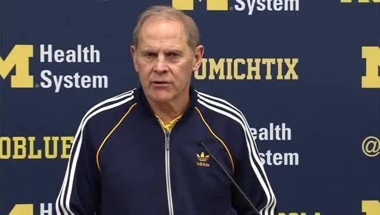 63038add-John_Beilein__Derrick_Walton_Jr___Aubrey_0_20160126224927