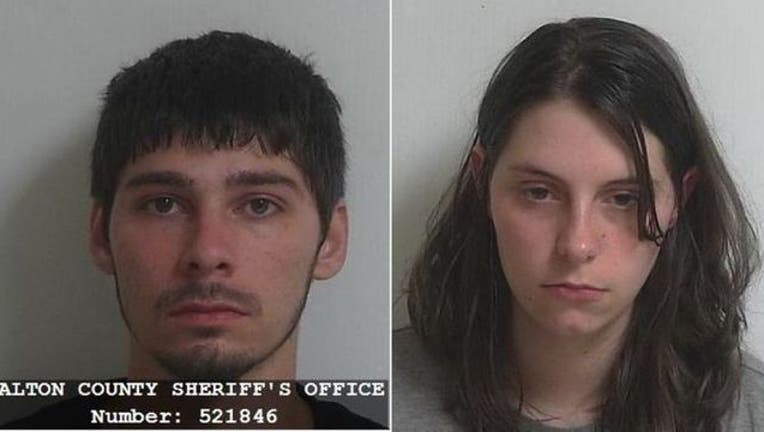 Justin and Jamie Whited. (Walton County Sheriff's Office)_1470683743255.jpg
