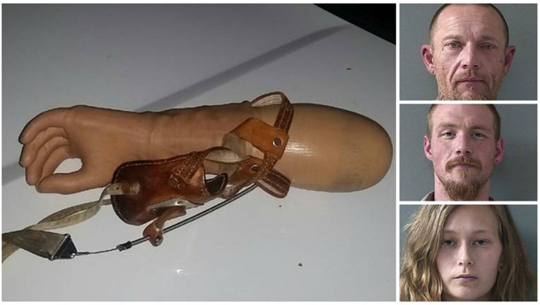 Stolen prosthetic arm and suspects-404023