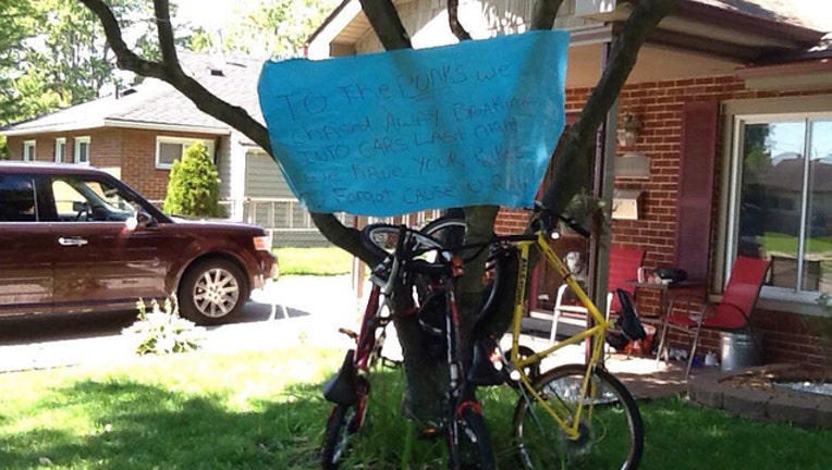 e3e55174-bikes strapped to tree_1472577529910.jpg