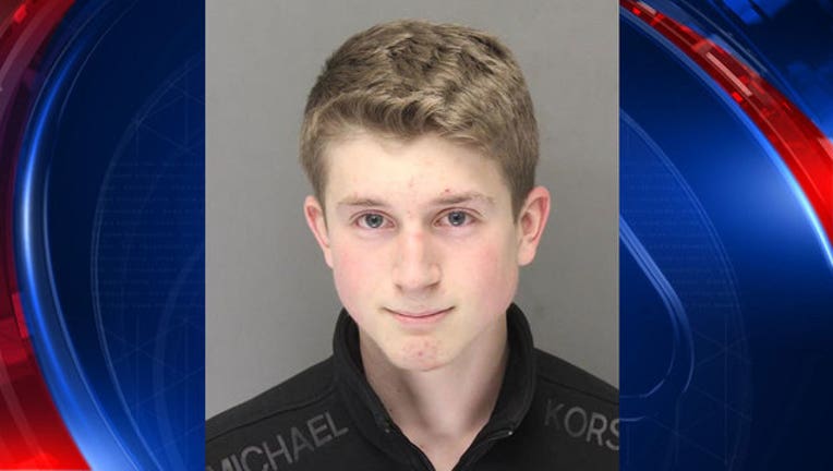4971751b-Teen accused of writing bomb threats on Canton High bathroom walls in court today