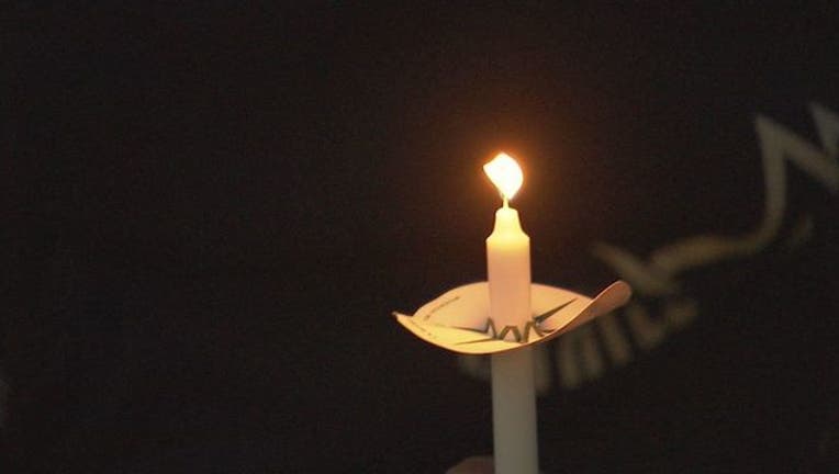 candelight vigil flame_1551789992005.jpg.jpg