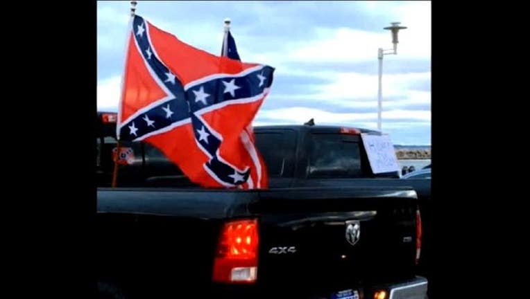 3dfdcd0c-confederate flag traverse city_1479158080137.JPG