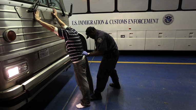 f16be4be-getty-ice immigration-082418