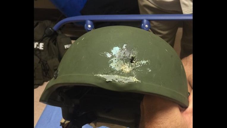 kevlar helmet saves officer's life_1465763928310.jpg