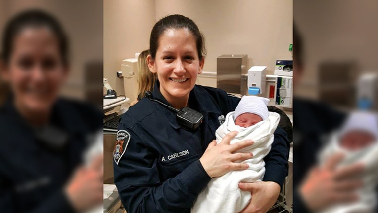 0129ffd4-officer carlson helps deliver baby_1522256741977.jpg.jpg