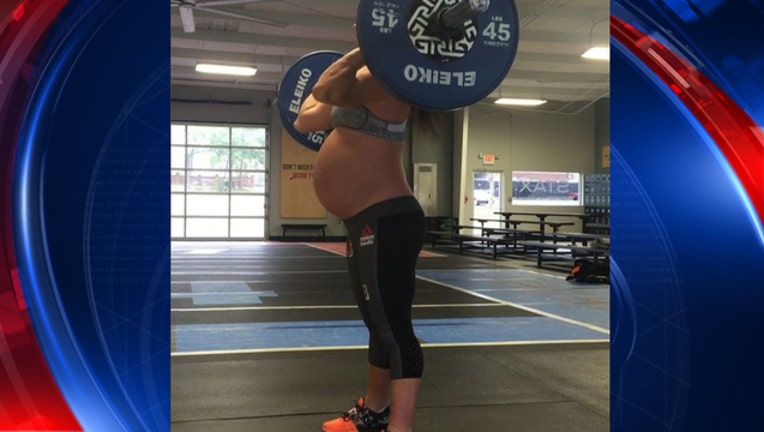 b61d8843-pregnancy crossfit lifter 4.15.16_1460738775921.JPG