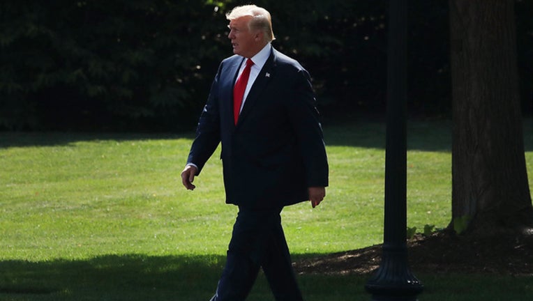 00867b42-president-trump-walking-GETTY-IMAGES_1502905951015.jpg