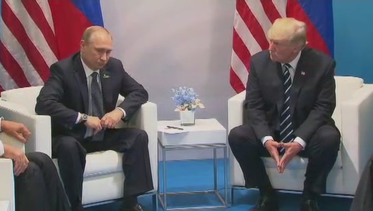 220fd71d-trump putin meeting_1499437224448.jpg