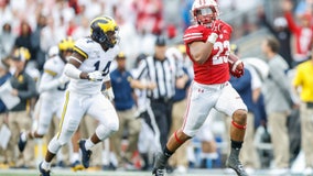 Taylor helps No. 13 Wisconsin trounce No. 11 Michigan