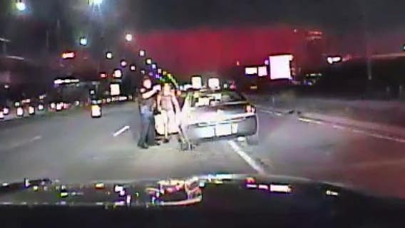 Troy PD dashcam shows super drunk woman with child in car arrest