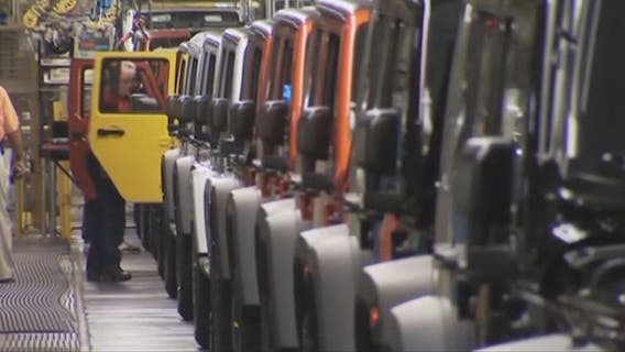 UAW reinstates mask mandate for workers at Ford, General Motors, and Stellantis plants