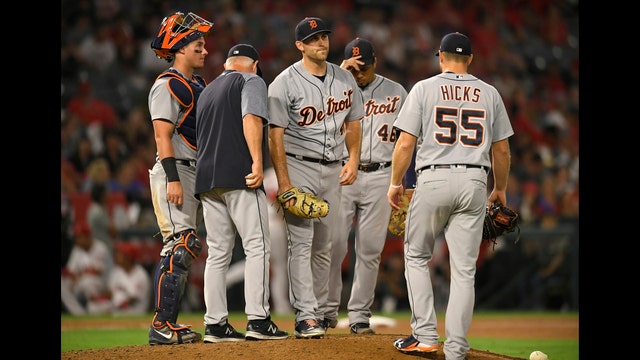 Halos roll past Tigers 6-2