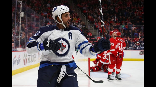 Byfuglien's late goal gives Jets 2-1 win over Red Wings