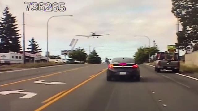 WATCH: Plane makes emergency landing on four lane road