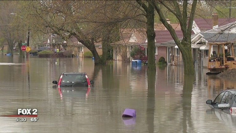 667f95c2-Residents_along_the_Ecorse_Creek_flood_h_0_20190501214159