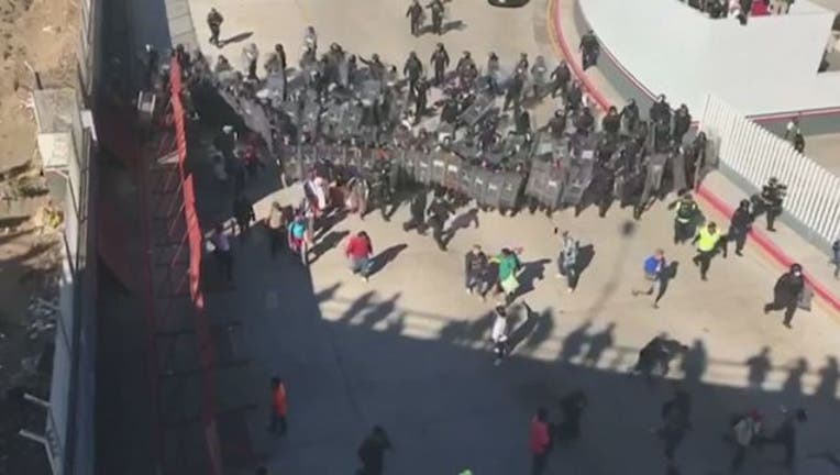 2c78eb3d-wjbk-migrant caravan protest-112918_1543521892870.jpg.jpg