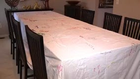 Family's signed Thanksgiving tablecloth from family members spans almost 60 years