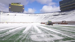 Removing the snow at U-M's Big House in time for the MSU game