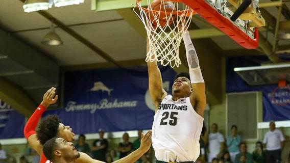 No. 3 Michigan State holds off Georgia in Maui