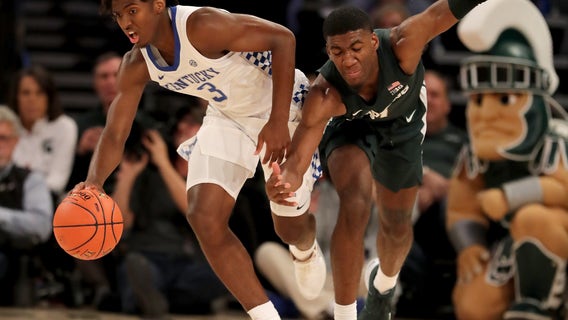 No. 2 Kentucky sneaks past No. 1 Michigan State 69-62