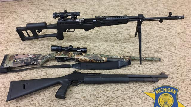 Drunk man passed out in car arrested in Macomb Co., 3 long guns seized