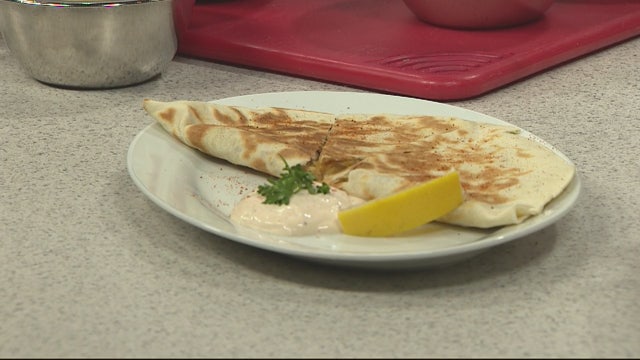 Making crab cake quesadilla for Ponchfest Nov. 14-16