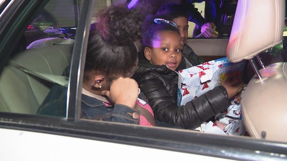 Detroit police officer hands out Christmas toys instead of tickets in honor of grandfather