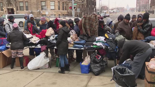 Volunteers help Detroit's homeless and in need on Christmas Eve