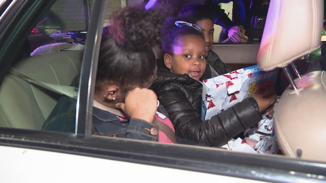 Detroit police officer hands out Christmas toys instead of tickets in honor of grandfather