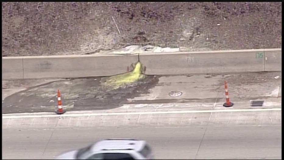 A yellow substance leaks onto 696 in Madison Heights.