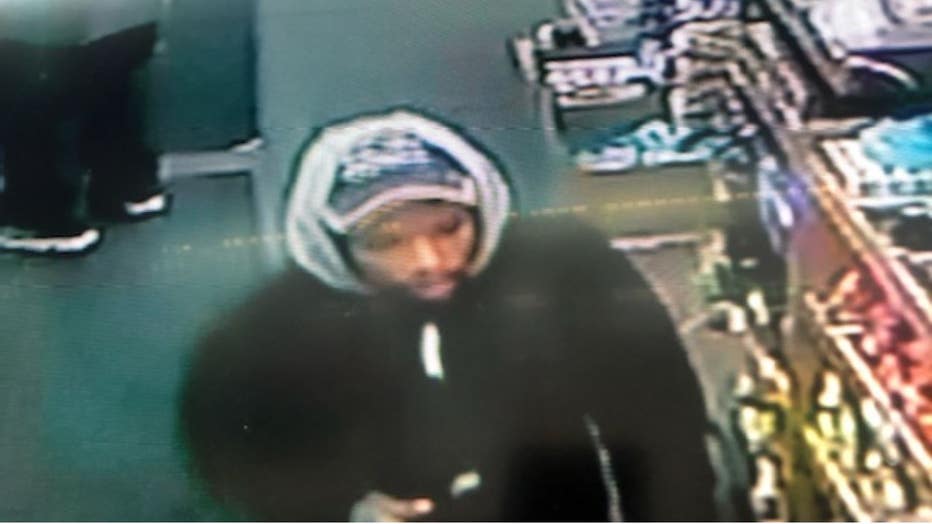 A surveillance photo that shows a suspect wanted for a deadly shooting on Detroit's east side.