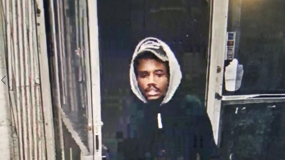 A surveillance photo that shows a suspect wanted for a deadly shooting on Detroit's east side.