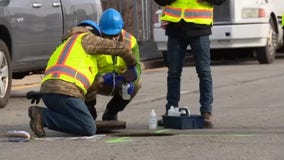 Crews take soil and water samples from chemical ooze site off I-696