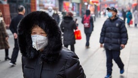 Virus death toll in China rises as U.S. prepares evacuation