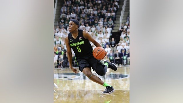 Winston sets record, No. 15 Spartans top Wisconsin