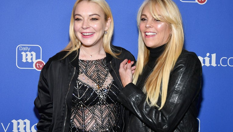 NEW YORK, NY - DECEMBER 06: Lindsay Lohan (L) and Dina Lohan attend DailyMail.com & DailyMailTV Holiday Party with Flo Rida on December 6, 2017 at The Magic Hour in New York City. (Photo by Slaven Vlasic/Getty Images for Daily Mail)