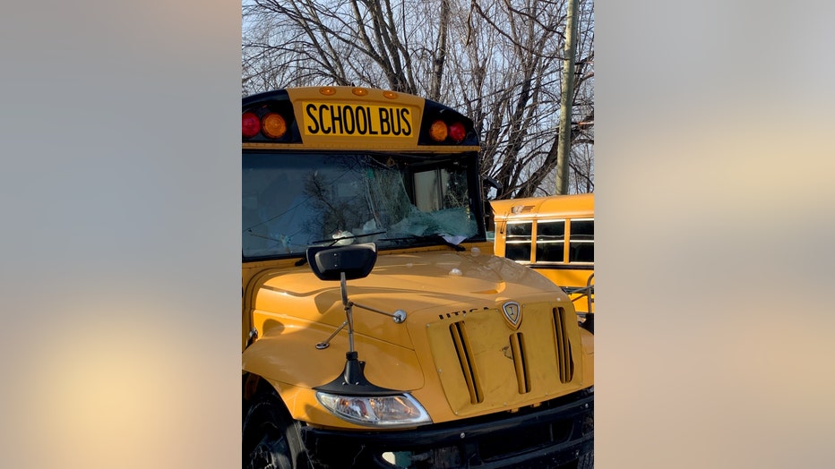 A photo of a shattered school bus windshield