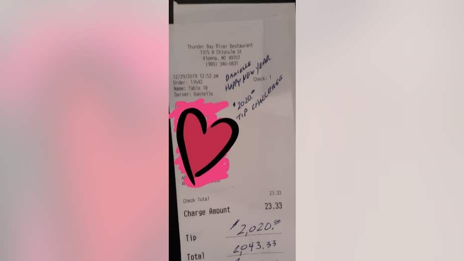A photo of the woman's receipt, showing the $2,020 tip