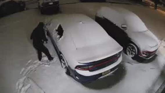 Dearborn Hts suspects pop back window of Charger, push it out in the snow in attempted theft
