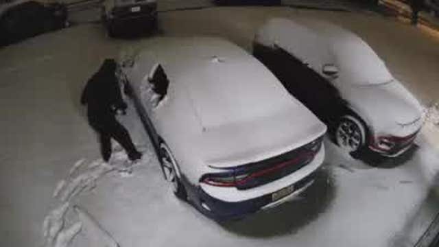 Dearborn Hts suspects pop back window of Charger, push it out in the snow in attempted theft