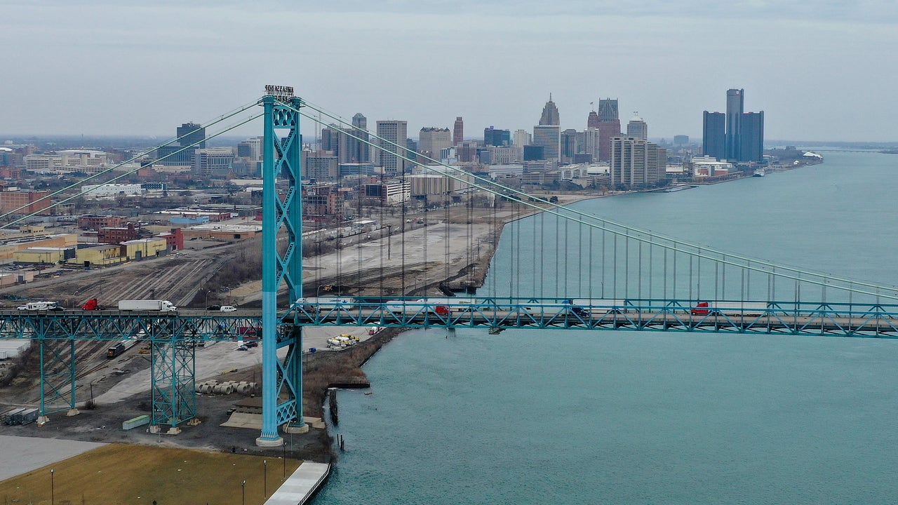 Man falls from Ambassador Bridge, rescued from Detroit River