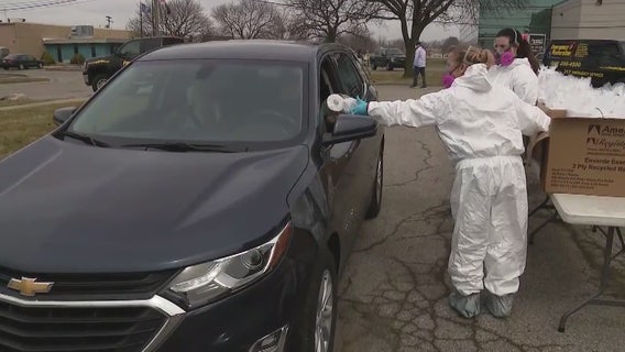 Brothers hand out toilet paper, hand sanitizer to Troy community