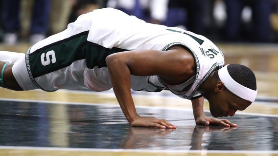 No. 16 Mich St tops No. 19 Ohio St 80-69, shares B10 title